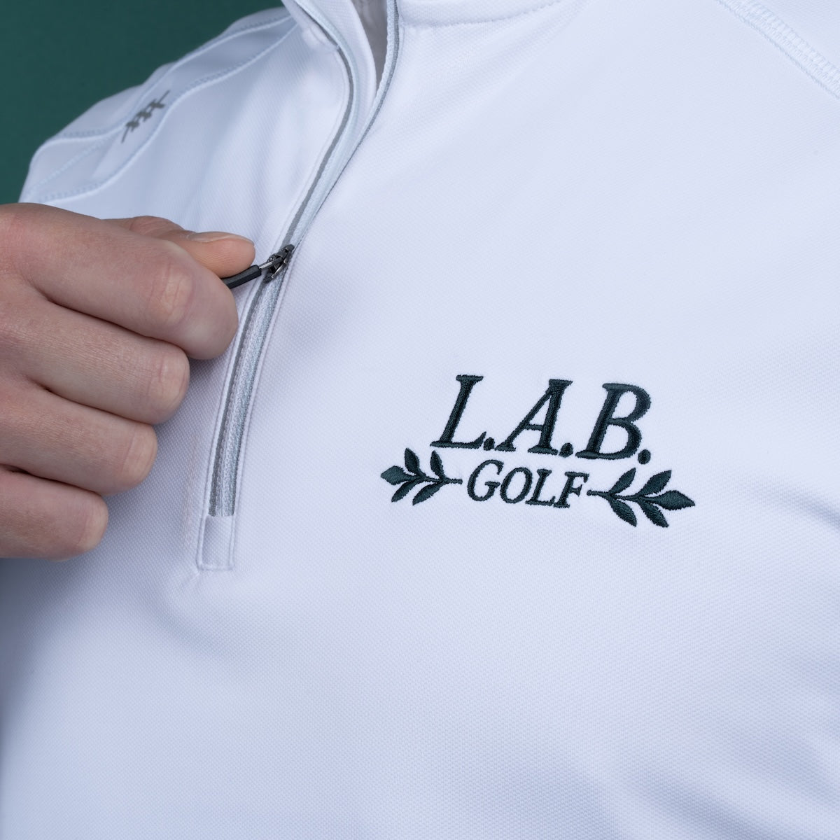 We’re All Patrons Q-Zip - White